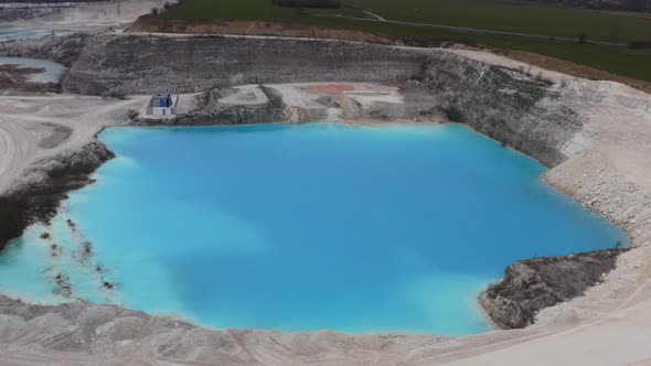 Drone Flight Over Limestone Quarry Pool