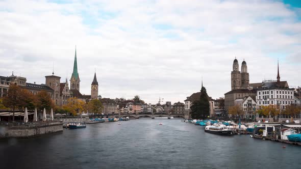Time lapse of Zurich city in Switzerland clouds moving fast over The Grossmunster (Great Minster Chu