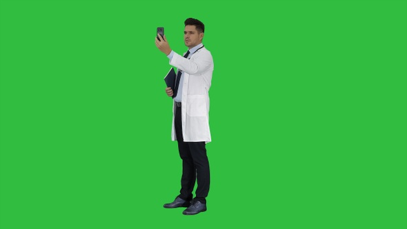 Male Doctor Making a Video Call Talking to His Patient
