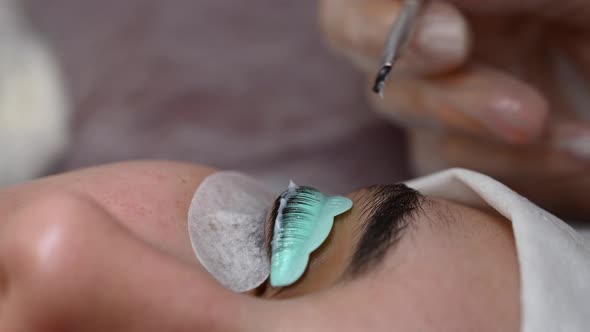 Closeup Portrait of a Woman on Eyelash Lamination Procedure