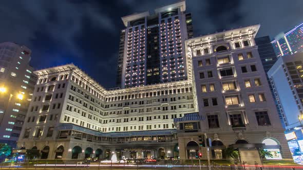 City Traffic Near The Peninsula Hotel Hong Kong Timelapse Hyperlapse at Night Located in Tsim Sha