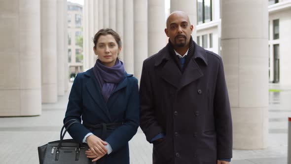 Portrait of Successful Confident Business People Looking at Camera Standing Outdoors Office Building