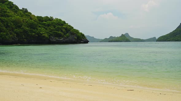 Beautiful Tropical Beach in Thailand, White Sand and Turquoise Sea Water Scenery on a Tropical Islan