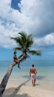 Anse Takamaka Beach Mahe Seychelles Tropical Beach with Palm Trees and a Blue Ocean Couple Man and