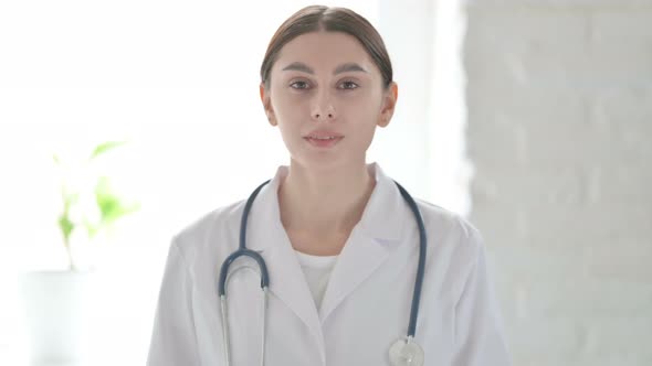 Portrait of Female Doctor Looking at the Camera