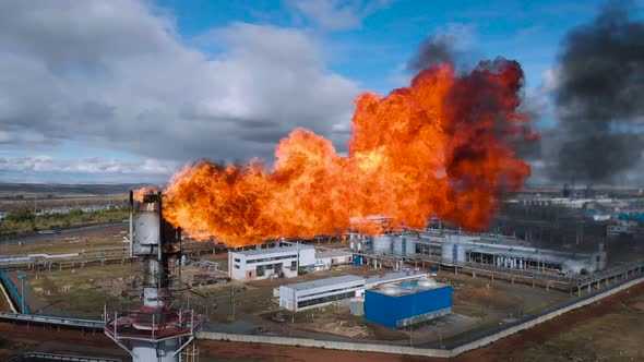 The Pipe at the Chemical Plant Burns the Residues of Natural Gas