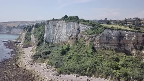 Rising drone view of the stunning UK South coast near Devon and the Jurassic Coast