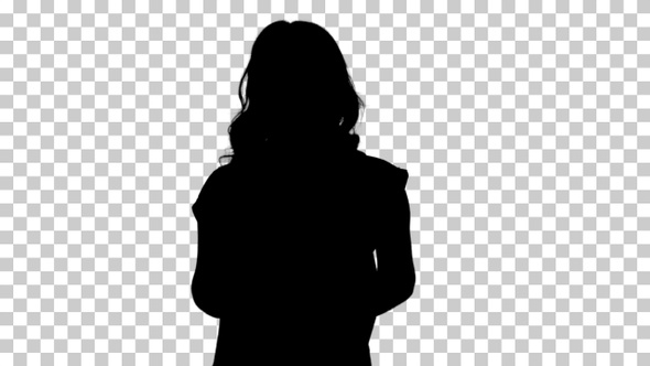 Silhouette Young good-looking woman in casual T-shirt with
