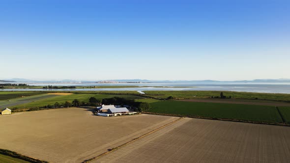 British Columbia, Canada Delta Westham Island Nature Trees Winery Farm Blue Sky Aerial Drone Footage