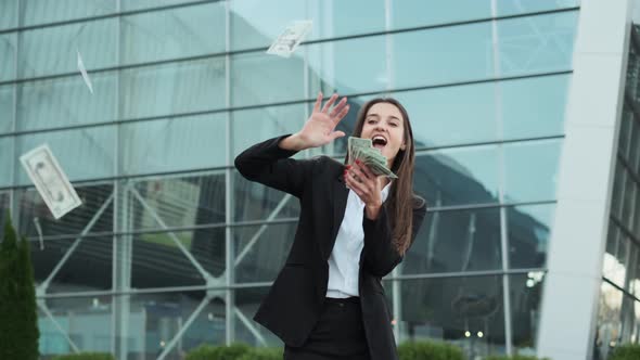 Young Business Lady Holding Money In Her Hands