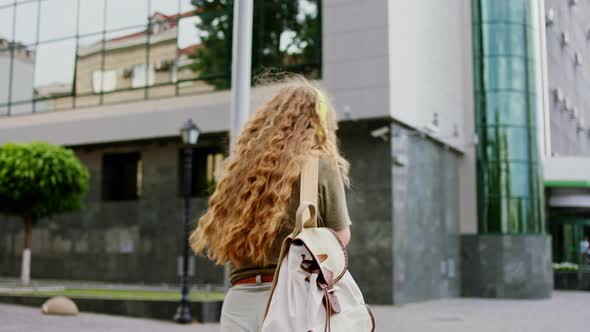 Charismatic Beautiful Lady in Long and Curly Hair