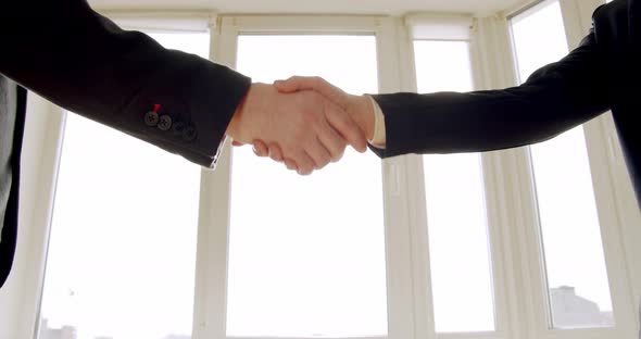 Slow Motion Female Businesswoman Male Businessman Shaking Hands Graduation Finalizing Deal