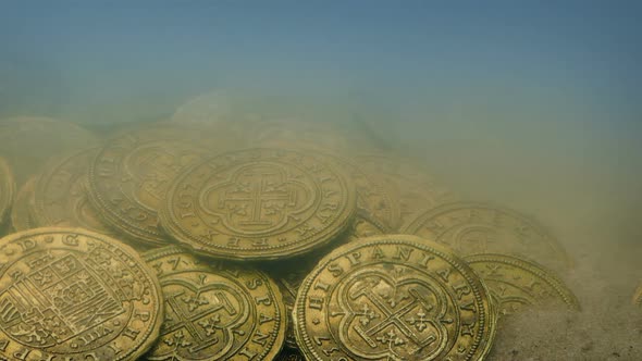 Gold Treasure Coins On The Sea Floor