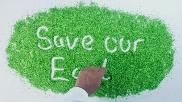 Green Hand Writing   Save Our Earth