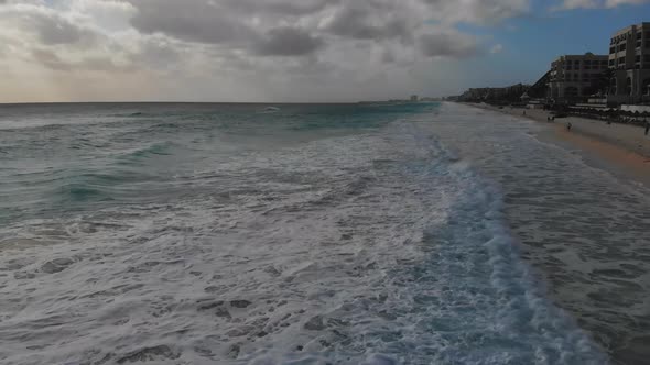 Aerial View to Ocean Waves on Blue Water Background