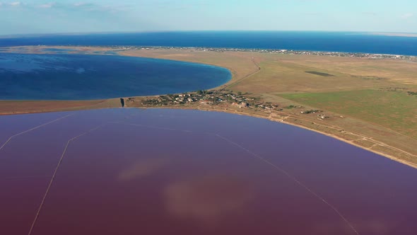 Beautiful top view of the salty, pink lake. Beautiful pink sunset.