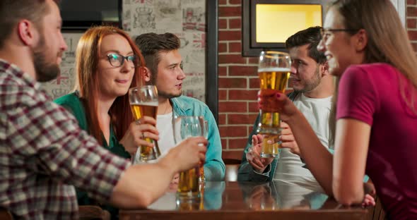 Group of Happy Tourist Young Caucasian Friend Drinking Alcohol Beer and Having Fun Laugh Enjoy