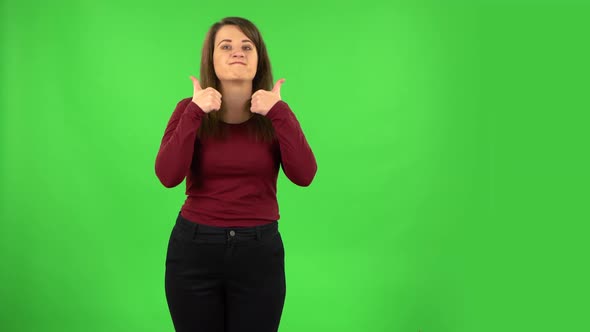 Pretty Girl Showing Thumbs Up, Gesture Like. Green Screen