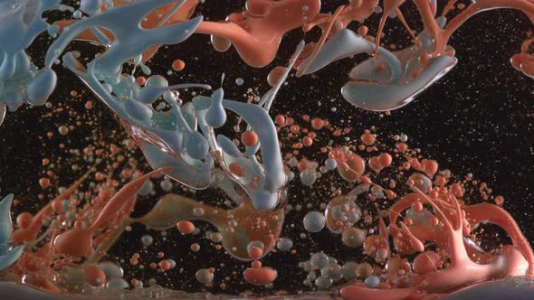 Slow motion shot of ink pouring into oil, shot with Phantom Flex 4K camera. alt