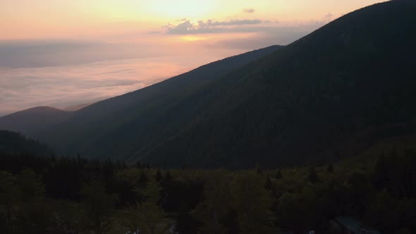 Aerial view of hills at sunset