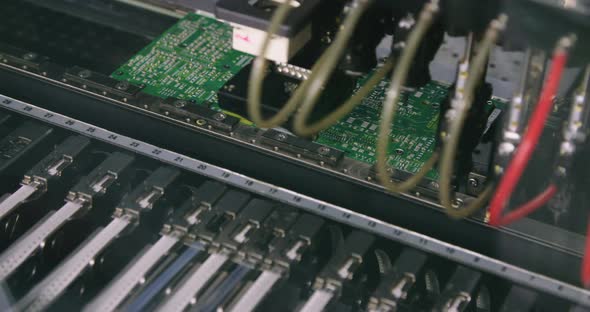 Surface Mount Technology SMT Machine places elements on circuit boards