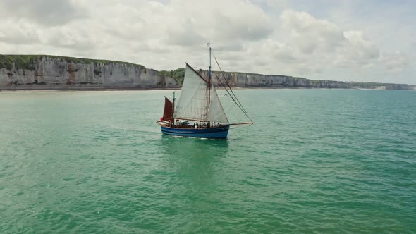 The Sailing Ship Moves Away From the Land Towards the Open Sea