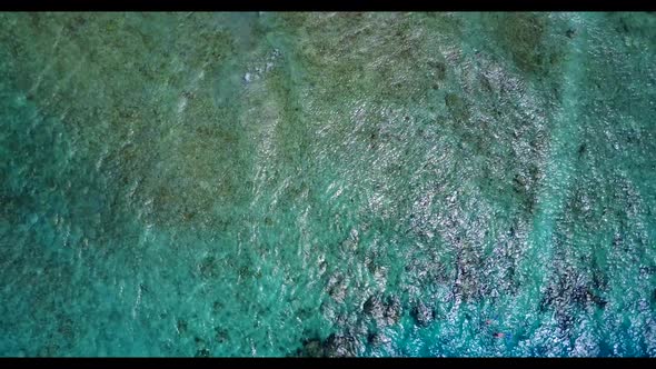 Aerial flying over abstract of beautiful sea view beach break by blue ocean with white sandy backgro