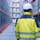 Worker male warehouse worker engineer man in a helmet working on the construction site - VideoHive Item for Sale