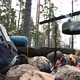 Backpack and Metal kettle on a campfire in the forest - VideoHive Item for Sale