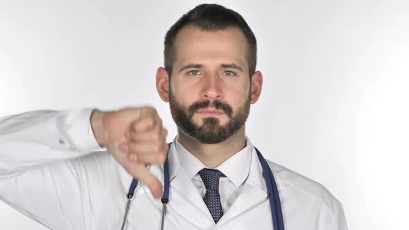 Portrait of Doctor Gesturing Thumbs Down