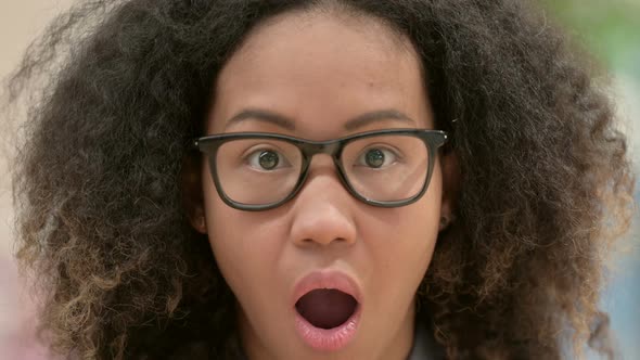 Close Up of Young African Woman with Shock Expression