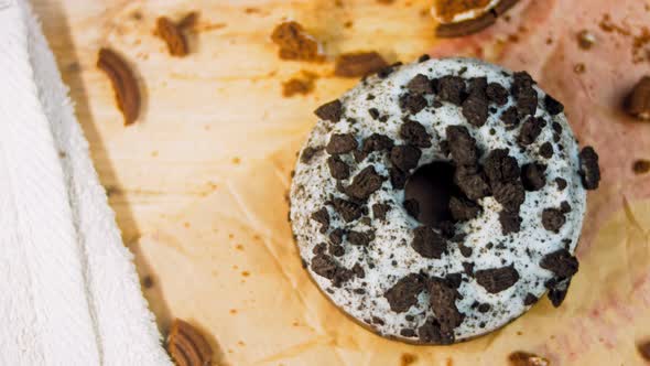 Chocolate Donuts Decorated with Pieces of Oreo Biscuits