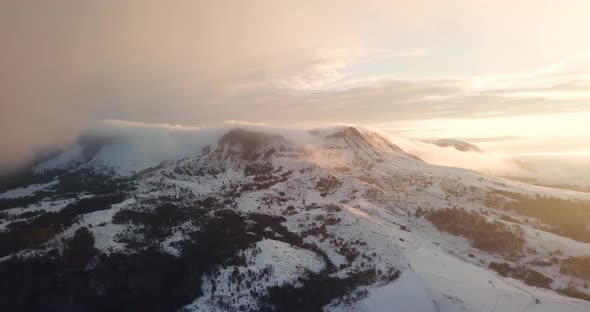 Beautiful Mountain Range Winter Landscape Clouds Aerial Flight Footage Over Peaks Epic Panorama