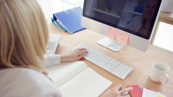 Businesswoman working on computer