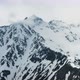 Aerial View from an drone of Beautiful Snowy Caucasus Mountain Landscape in Winter - VideoHive Item for Sale
