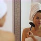Young attractive woman with bath towel on her head and brush dances - VideoHive Item for Sale