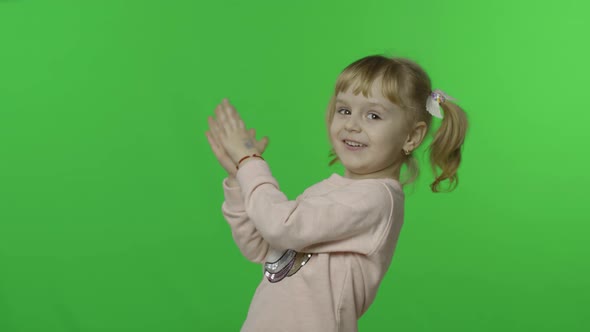 Girl in Unicorn Sweatshirt Dancing. Happy Four Years Old Child. Chroma Key