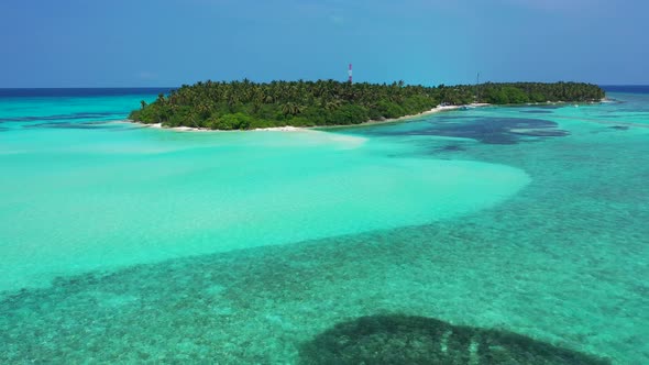 Beautiful sea texture with coral reefs and rocks of sea bottom seen through clear transparent water