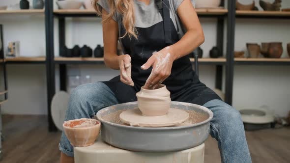 Handcraft Young Female Potter Makes a Pitcher Out of Clay Production of Handmade Tableware Pottery