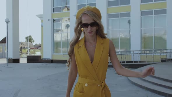 Confident Stylish Woman Walking on Street