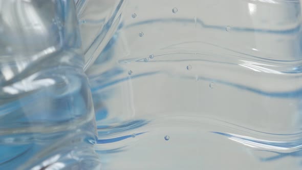 Close-up of healthy and fresh water in PET container 3840X2160 UltraHD footage - Bubbles of air on b