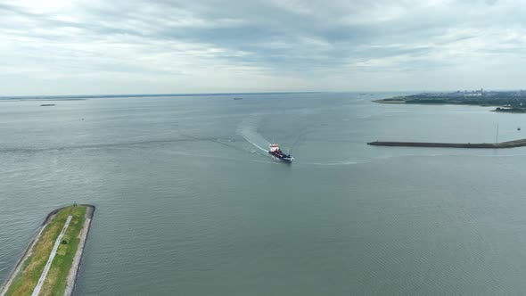 Self Unloading Barge Carrying Cargo At Sea