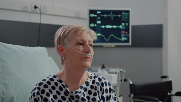 Close Up of Retired Woman with Nasal Oxygen Tube