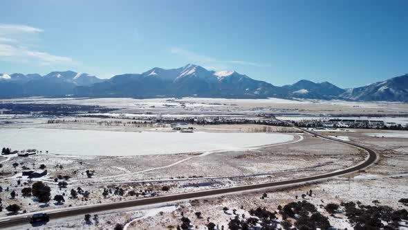 Reveal of Colorado mountain highway 285 from the Collegiate Peaks overlook, aerial