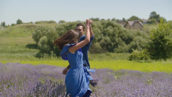 Multiethnic Couple Having Fun in Lavender Field