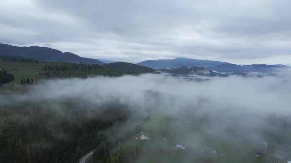 Ukraine, Carpathians: Fog in the Mountains. Aerial.