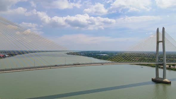 Famous Tsubasa Bridge With Traffic Across Mekong River Near Phnom Penh. Longest Bridge In Cambodia.