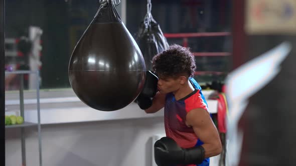 Latino Boxer Punching Being Aggressive and Focused