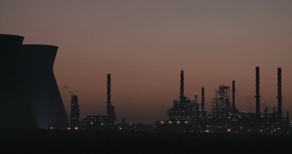 Sunrise over a large oil refinery