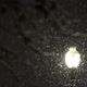 Slow motion snow storm as street light makes the snow glow - VideoHive Item for Sale